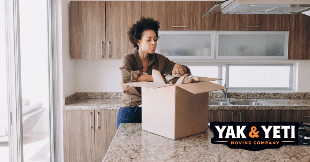 a woman opening a box